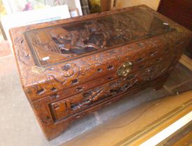 A carved eastern chest.