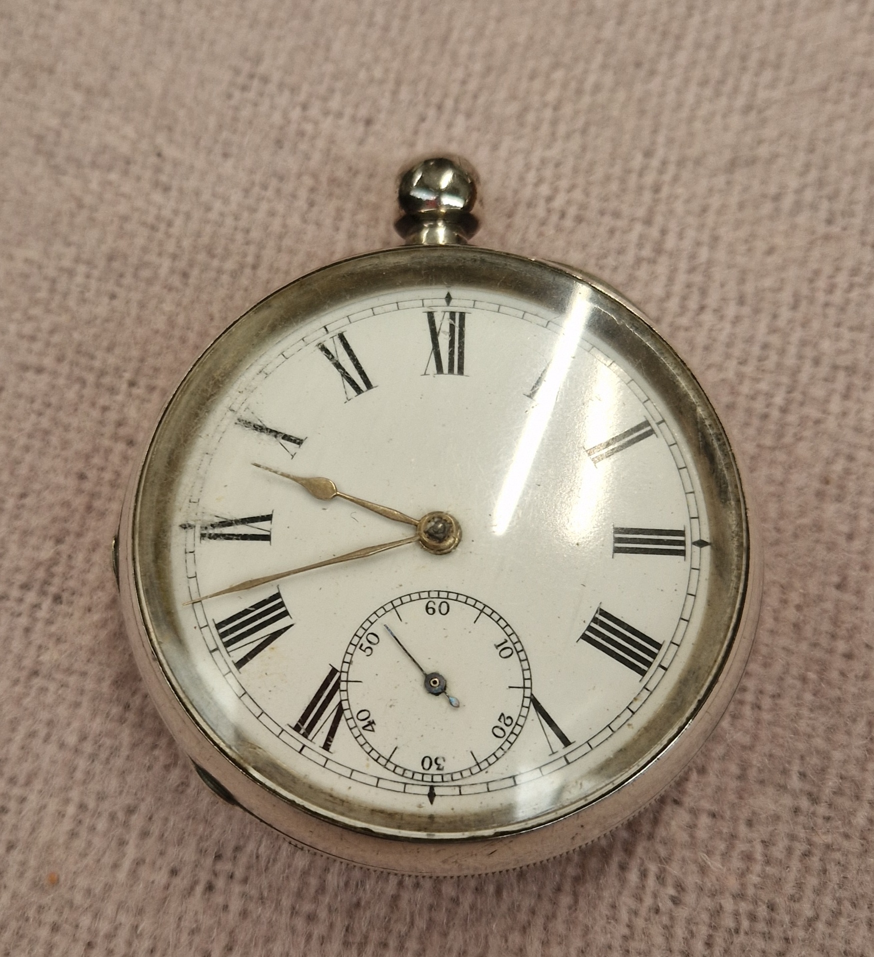 A hallmarked silver pocket watch.