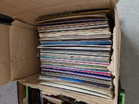 A box of assorted records.