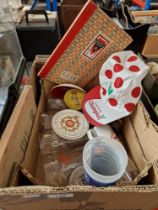 A box of mixed collectables including catalogues, polka dot cap, advertising ware, vintage tins,