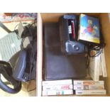 A Sega Master System II with games and accessories.