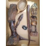 A box of assorted African items incl two figures one from a root carving