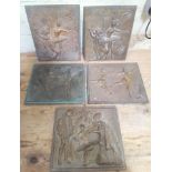 A group of five bronze plaques depicting dancers, approximately 27cm x 22cm each.