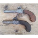 Two 19th century percussion cap pistols, lengths 15.5cm & 17.5cm.