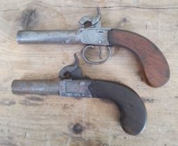 Two 19th century percussion cap pistols, lengths 15.5cm & 17.5cm.