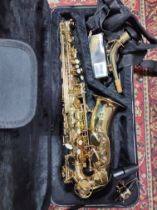 An Artemis brass alto saxophone, model AL89049, serial no.321091, with accessories and case.