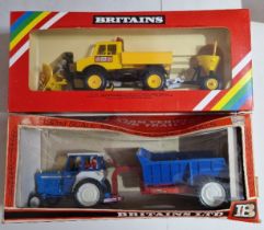 Two Britains diecast models comprising of a 9630 Ford 5000 Tractor and Rear Dump & a 9595 Snow