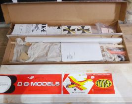 Two unbuilt radio control aeroplane kits comprising a DB Models Tinker and a Global Quality Kits