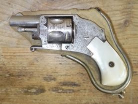 A Belgian .230 calibre centre fire pocket revolver, engraved side plates and mother of pear