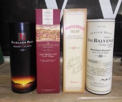 A group of four single malt scotch whiskies comprising Balvenie Founders Reserve, Bruichladdich,