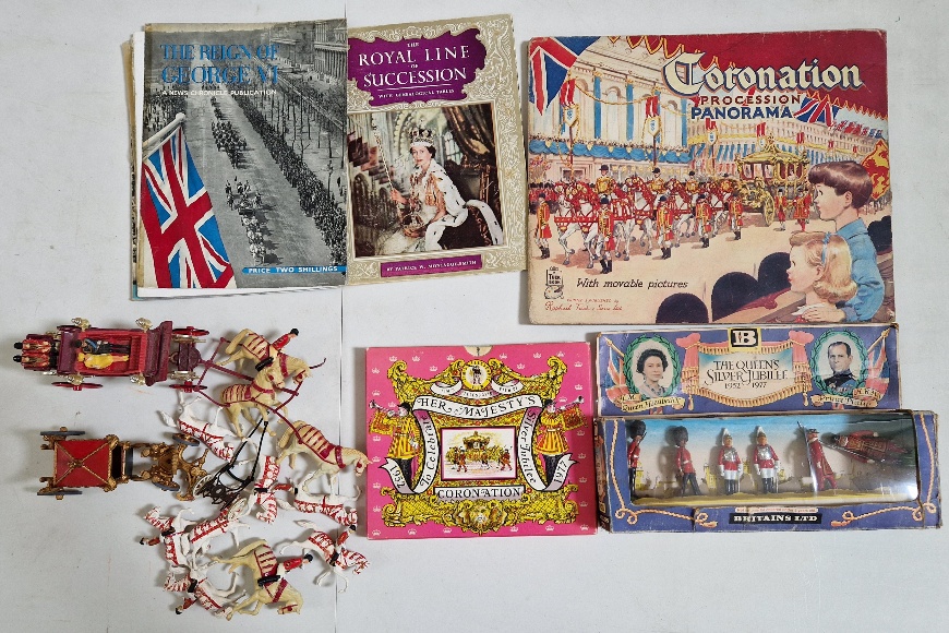 A tray of Royal commemorative items to include a boxed Britains 'THE QUEEN'S JUBILEE' model