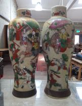 A pair of Chinese porcelain crackle glaze vases, archaic marks to bases, height 30cm.
