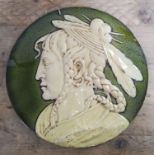 A Webb & Co, Leeds Faience cameo wall plaque, circa 1880, diameter 37cm.