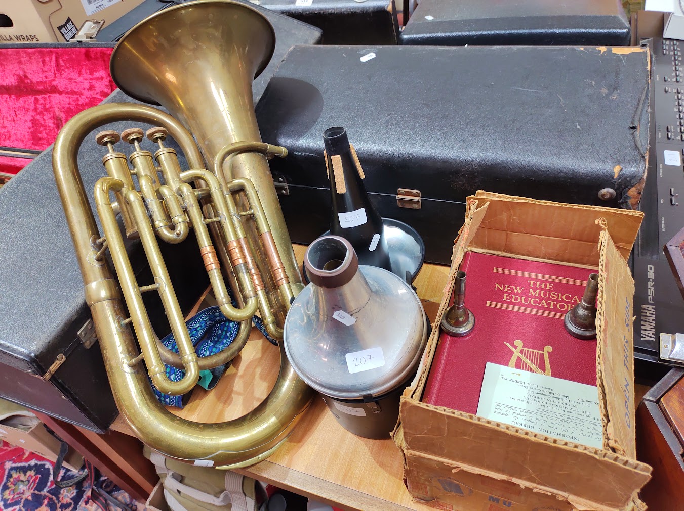 A Boosey brass euphonium by Besson & Co. London, serial no.H75983, with accessories and 'The New