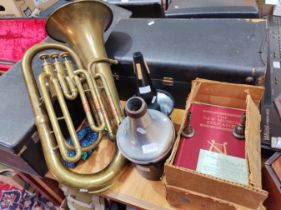 A Boosey brass euphonium by Besson & Co. London, serial no.H75983, with accessories and 'The New