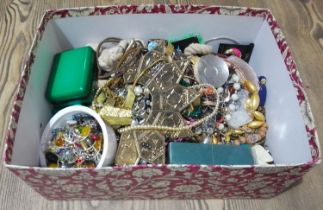 A box of assorted costume jewellery.