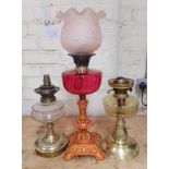 A group of three oil lamps.(one has been converted to electric)