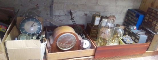 A quantity of clock spares including carriage clocks etc.