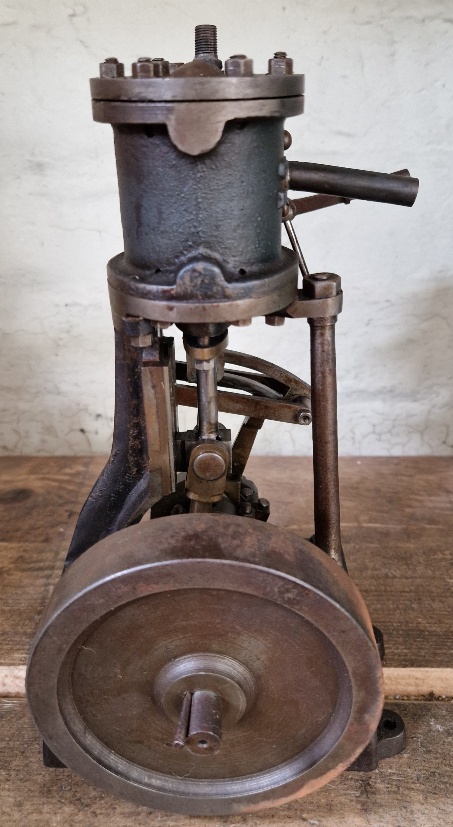 A well engineered model of a live steam vertical stationary engine, height is 25cm.