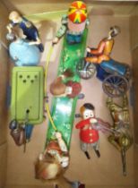 A group of six vintage wind up toys comprising a snooker player, dancing couple, soldier, children
