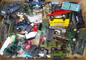 A box of assorted die-cast model vehicles.