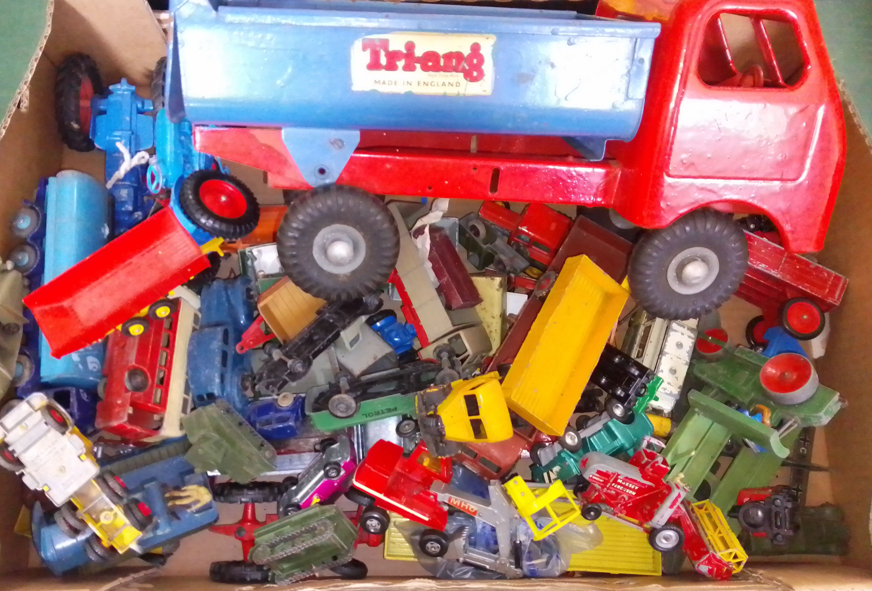A box of assorted die-cast vehicles including Triang, Dinky, Lesney, Corgi.