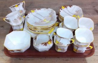 A Shelley Sunrise and Tall Trees Art Deco tea service, 40 pieces.