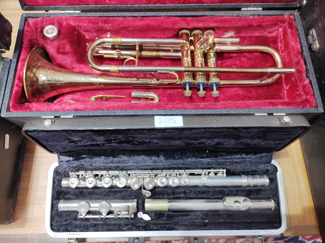A York trumpet, serial no.590302 and a Bundy flute, serial no.545213, both with hard cases.