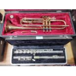 A York trumpet, serial no.590302 and a Bundy flute, serial no.545213, both with hard cases.