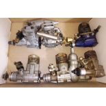 A group of six assorted radio control model aeroplane engines comprising a Taipan TS 40, a