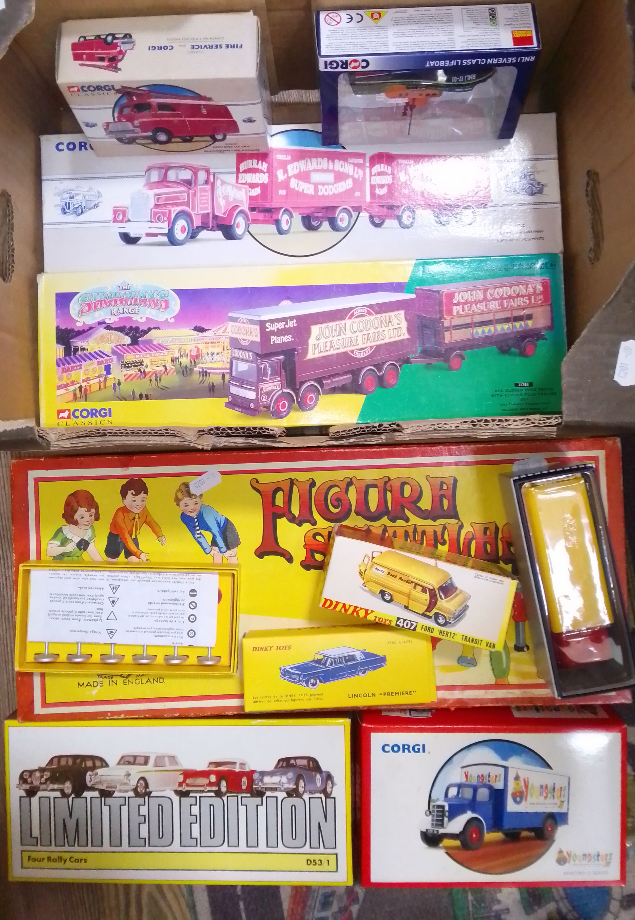 A box of die cast model vehicles including Dinky and Corgi, three in reproduction boxes.