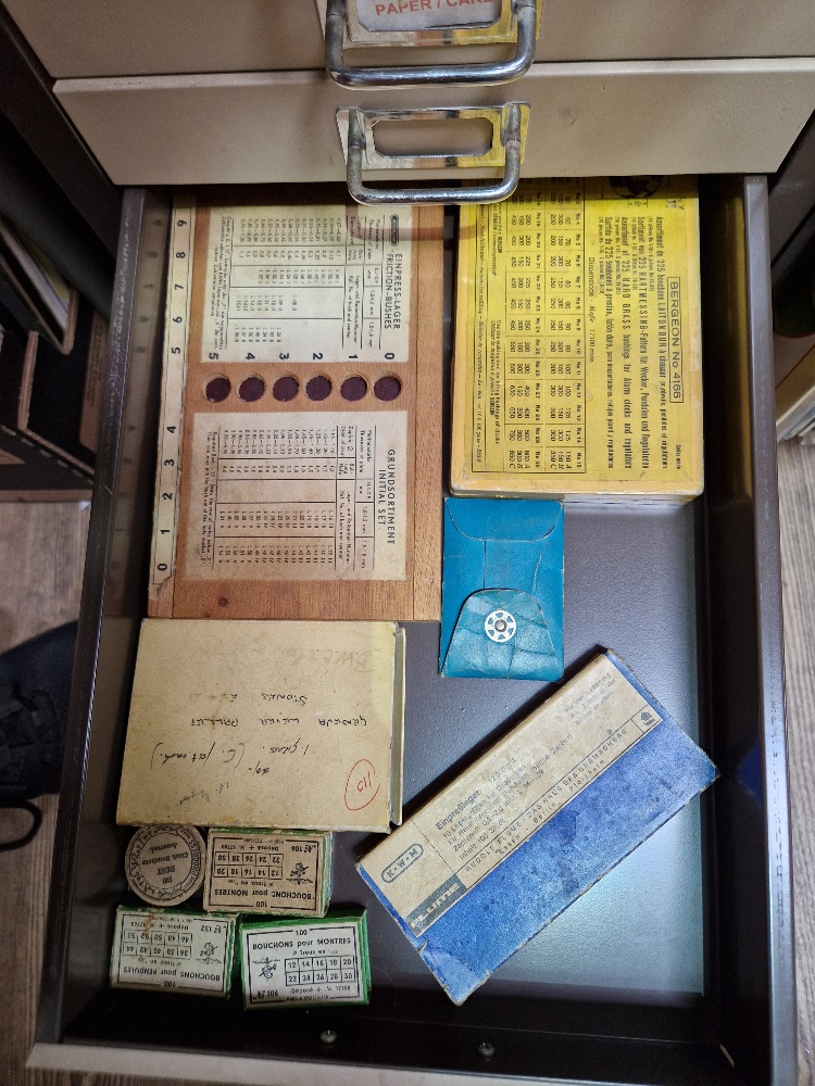 A 15 drawer triumph metal cabinet and contents comprising of clock making spares. - Image 16 of 16