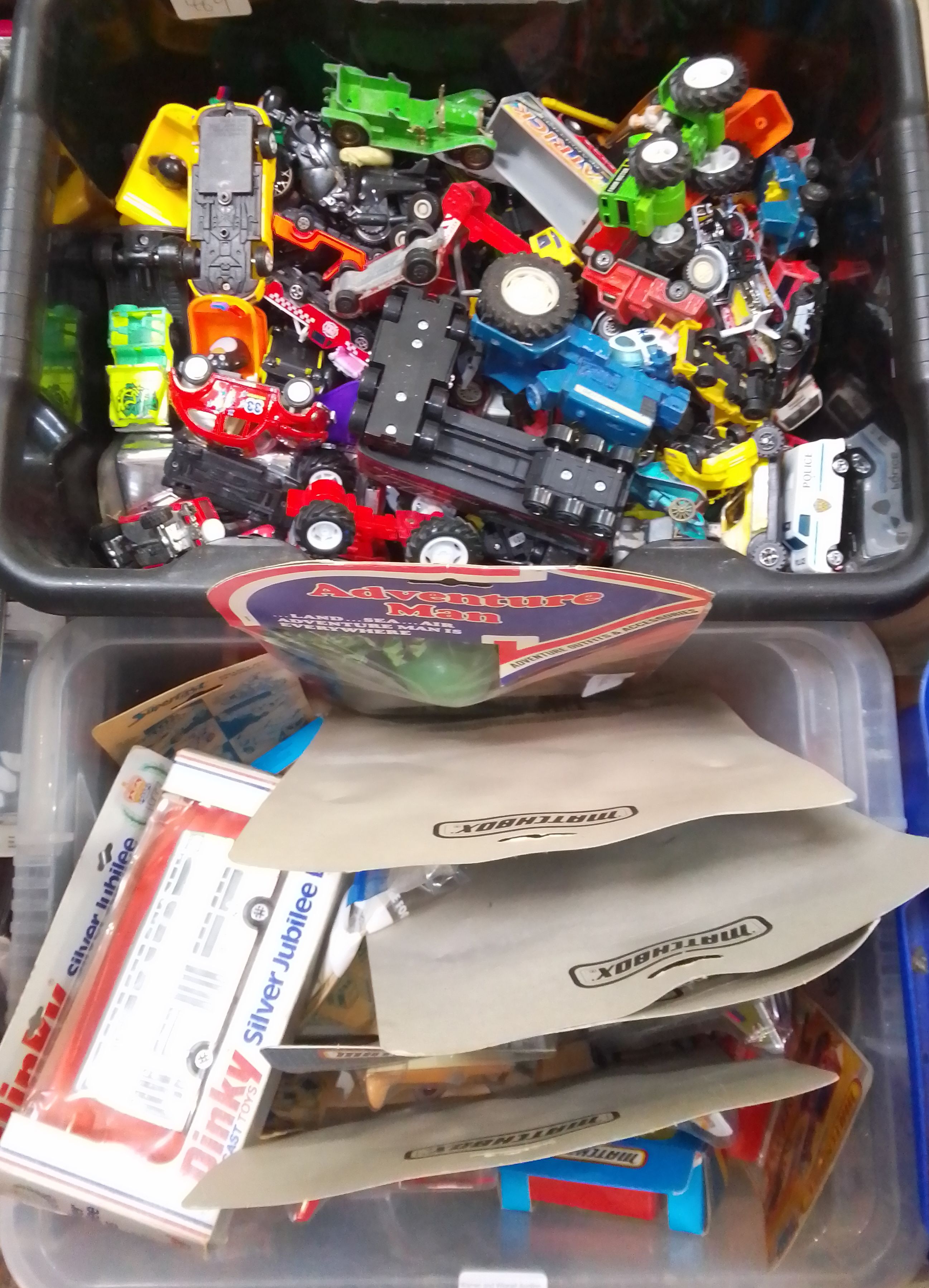 Two boxes of mainly die-cast model vehicles.