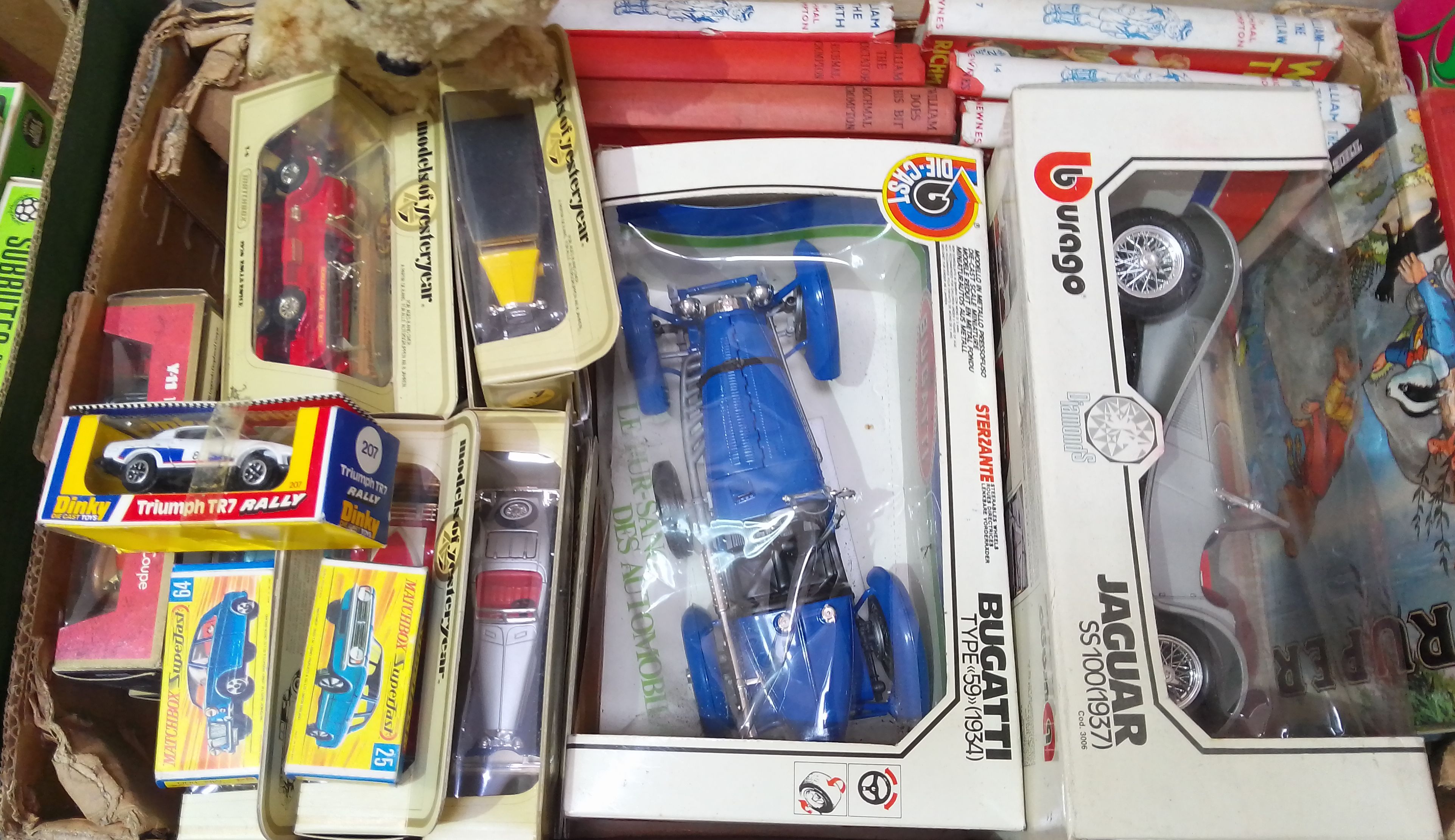 A box of assorted die-cast model vehicles comprising two Burago models: Bugatti Type 59 and Jaguar