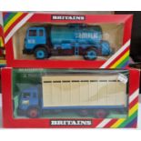 Two Britains diecast models comprising of a 9580 Animal Transporter & a 9604 Milk Transporter,