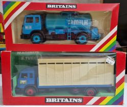 Two Britains diecast models comprising of a 9580 Animal Transporter & a 9604 Milk Transporter,