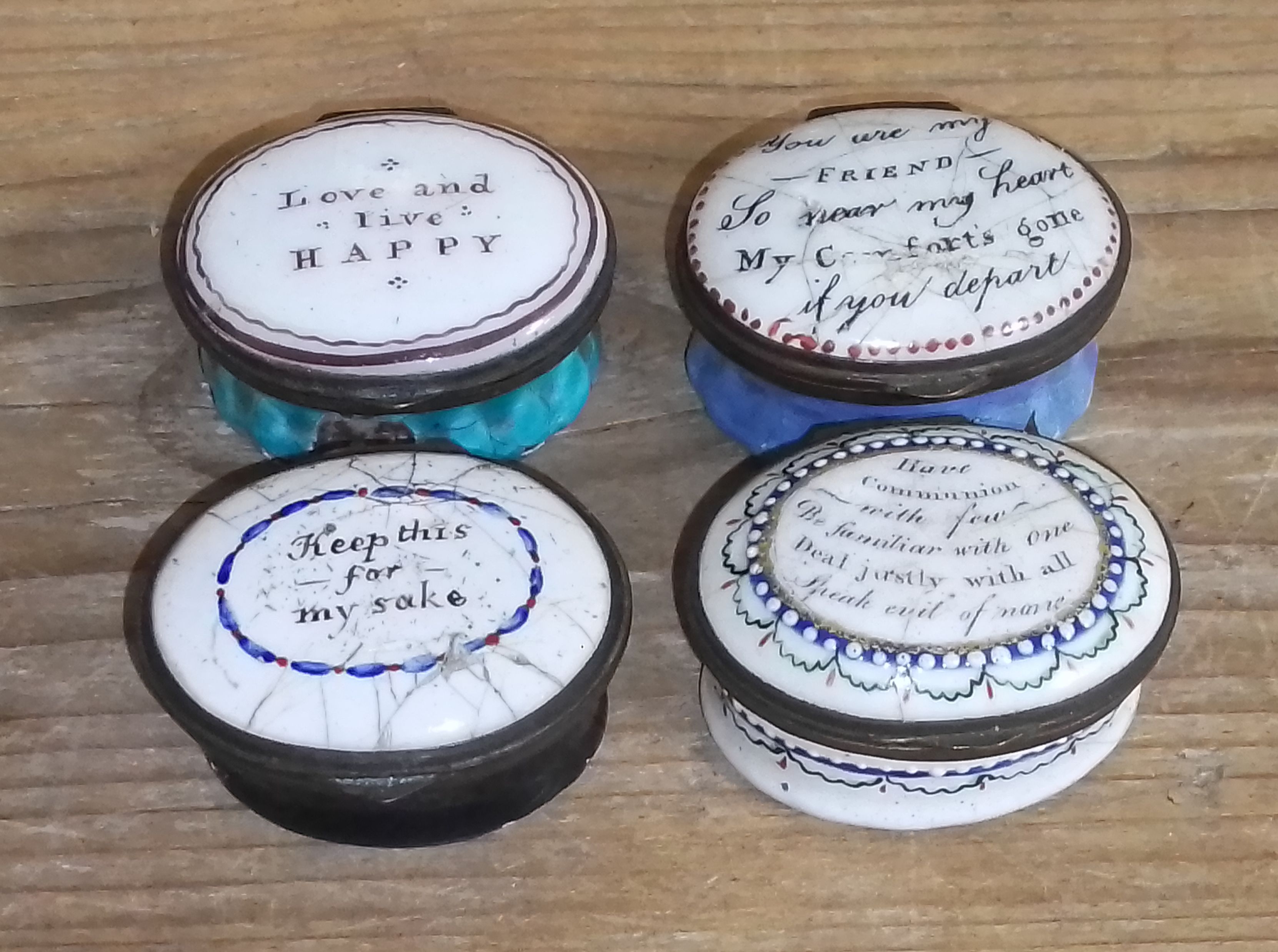 A group of four early 19th century Bilston type enamel patch boxes.