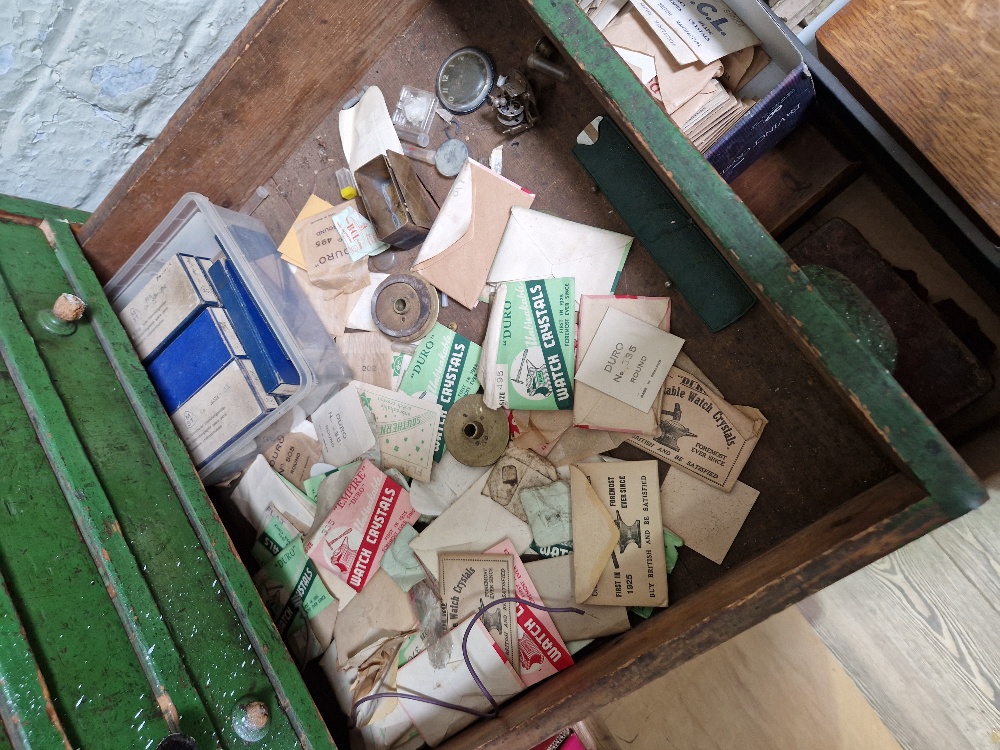 A large green horologist's chest and contents comprising watch and clock making spares. - Image 2 of 12