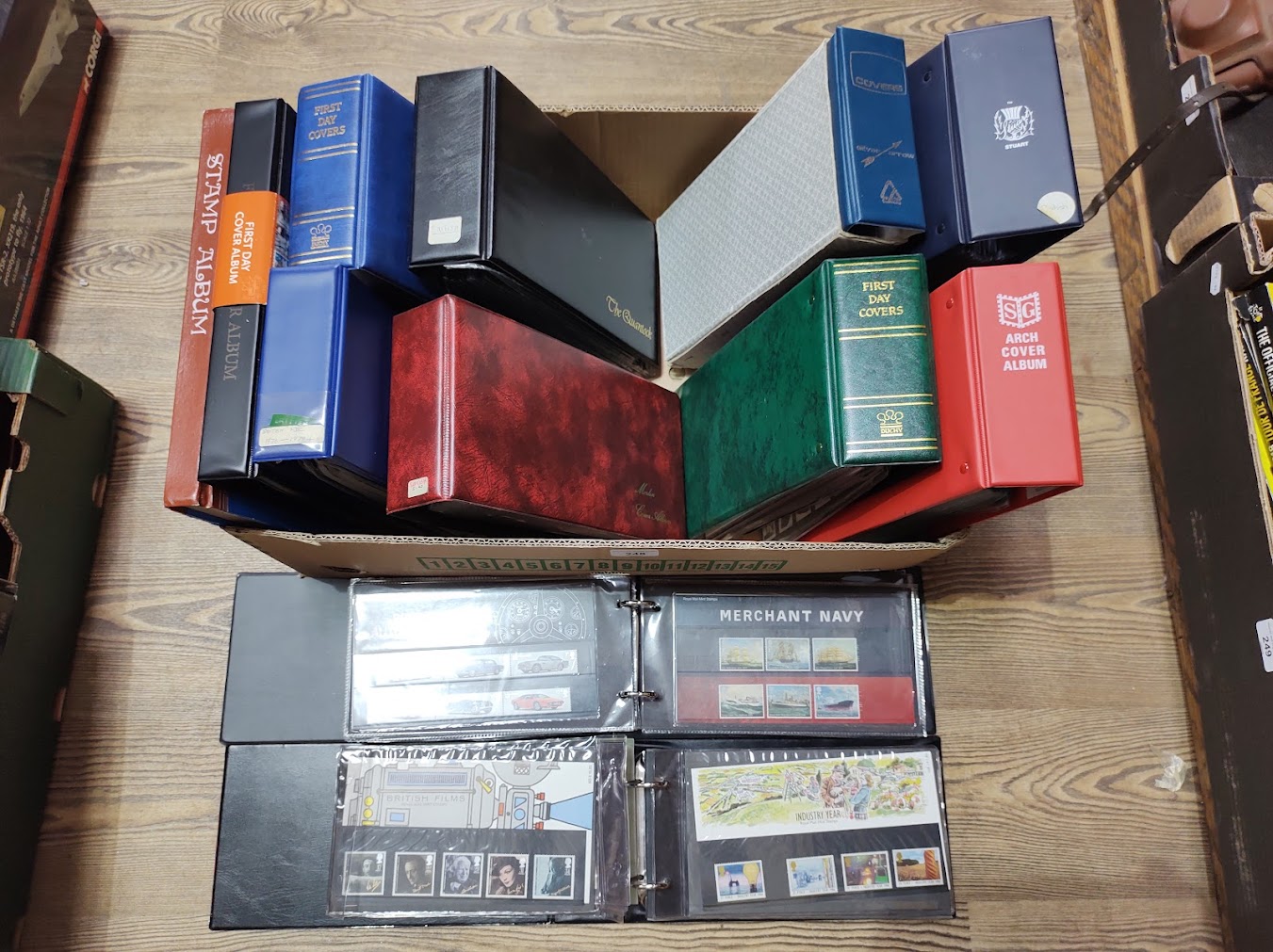 10 folders and an album of Royal Mail Mint Stamp Sets/Presentation Packs and an album of Mint