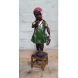 A cold painted bronze modelled as a young girl, height 36.5cm.