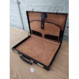 A black leather Hilton Collection executive case by Papworth Industries (Swaine Adeney Brigg),