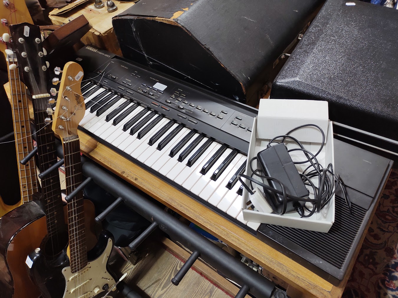 An Encore black electric guitar together with a Viva acoustic guitar, a Yamaha PSR-50 keyboard and - Image 2 of 2