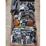 Two boxes and a hard case of cameras binoculars and accessories including Nikon & Canon 35mm