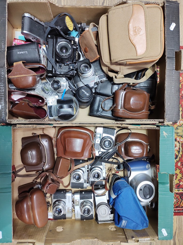 Two boxes of assorted cameras including Canon, Voigtlander, etc.