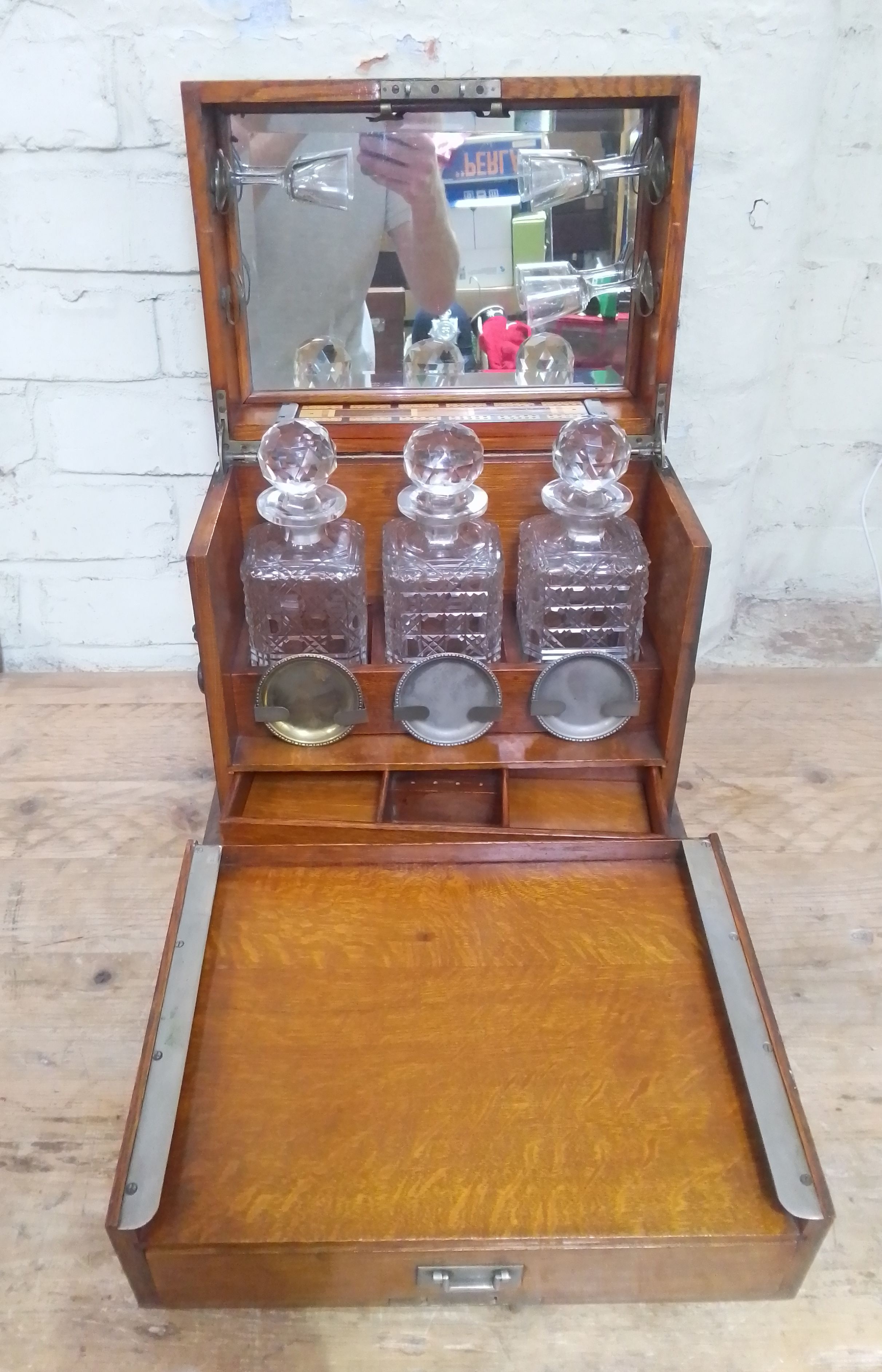 A three bottle oak games tantalus.