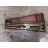 A 19th century gilt brass pantograph in fitted mahogany case.