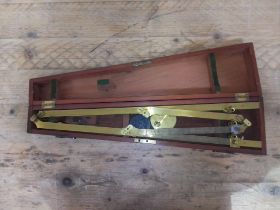 A 19th century gilt brass pantograph in fitted mahogany case.