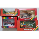 Four Britains diecast models comprising of a 9480 Land Rover Discovery, a 9533 Log Transporter, a