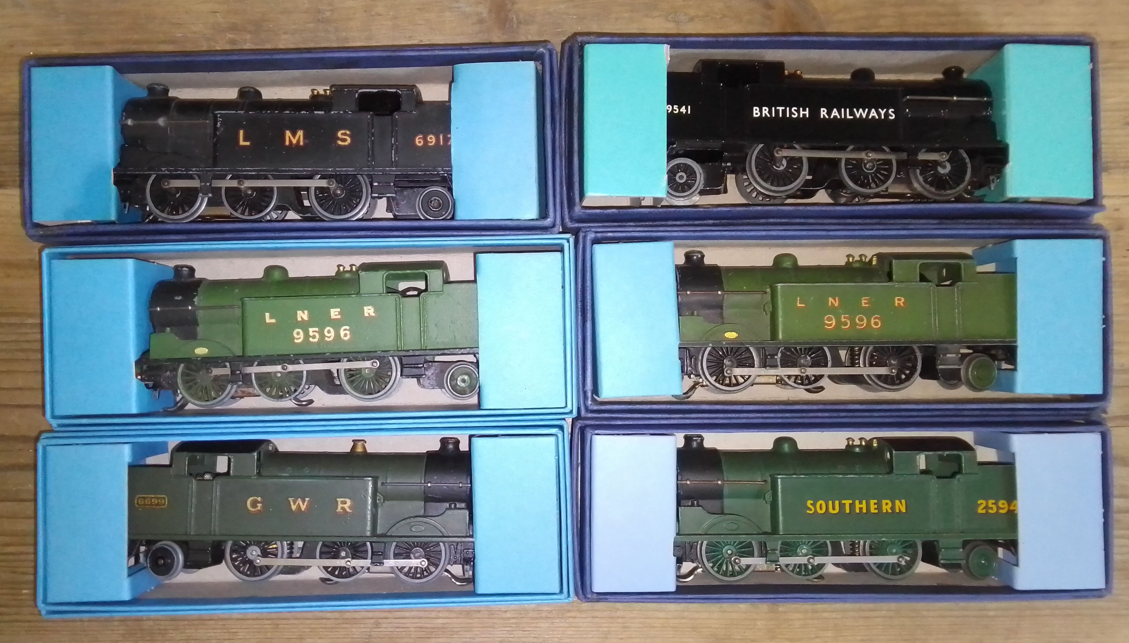A group of six Hornby Dublo 3 rail EDL7 Tank Locomotives, two in reproduction boxes