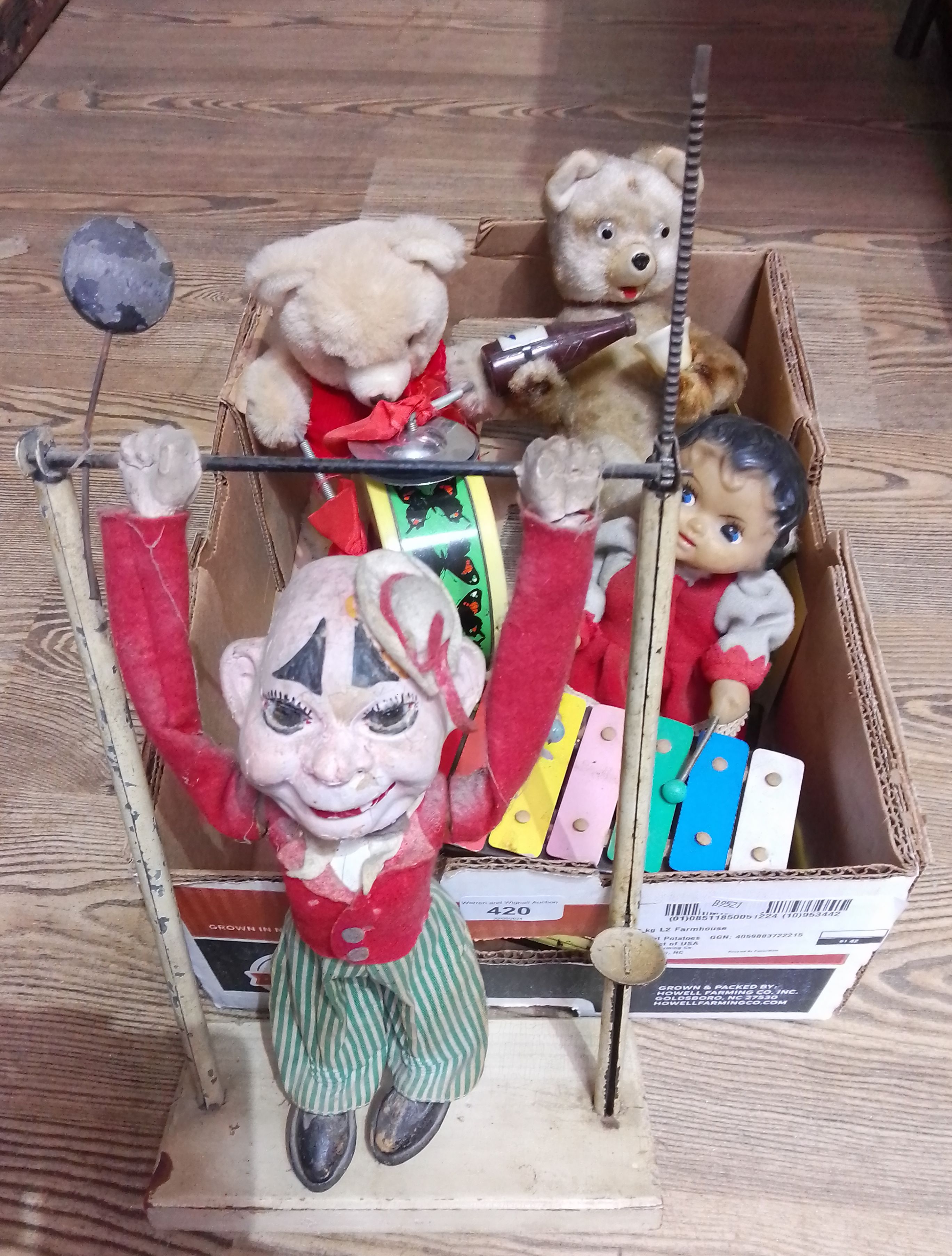 A group of three vintage battery operated automaton toys comprising two bears and a xylophone